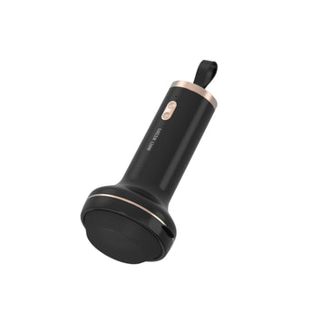 A black and gold Green Lion Relax Pro Body Massager with a digital display and a metallic band.
