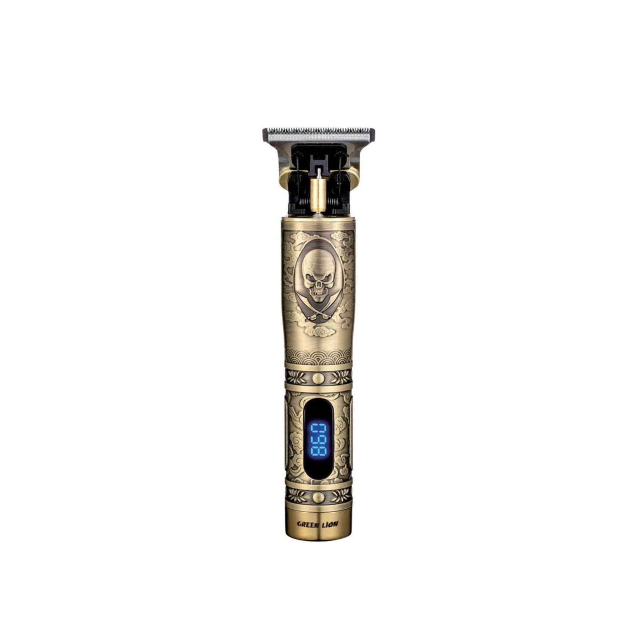 A gold-colored hair trimmer with an LCD display and a skull symbol on the metal body, resembling a pirate ship design.