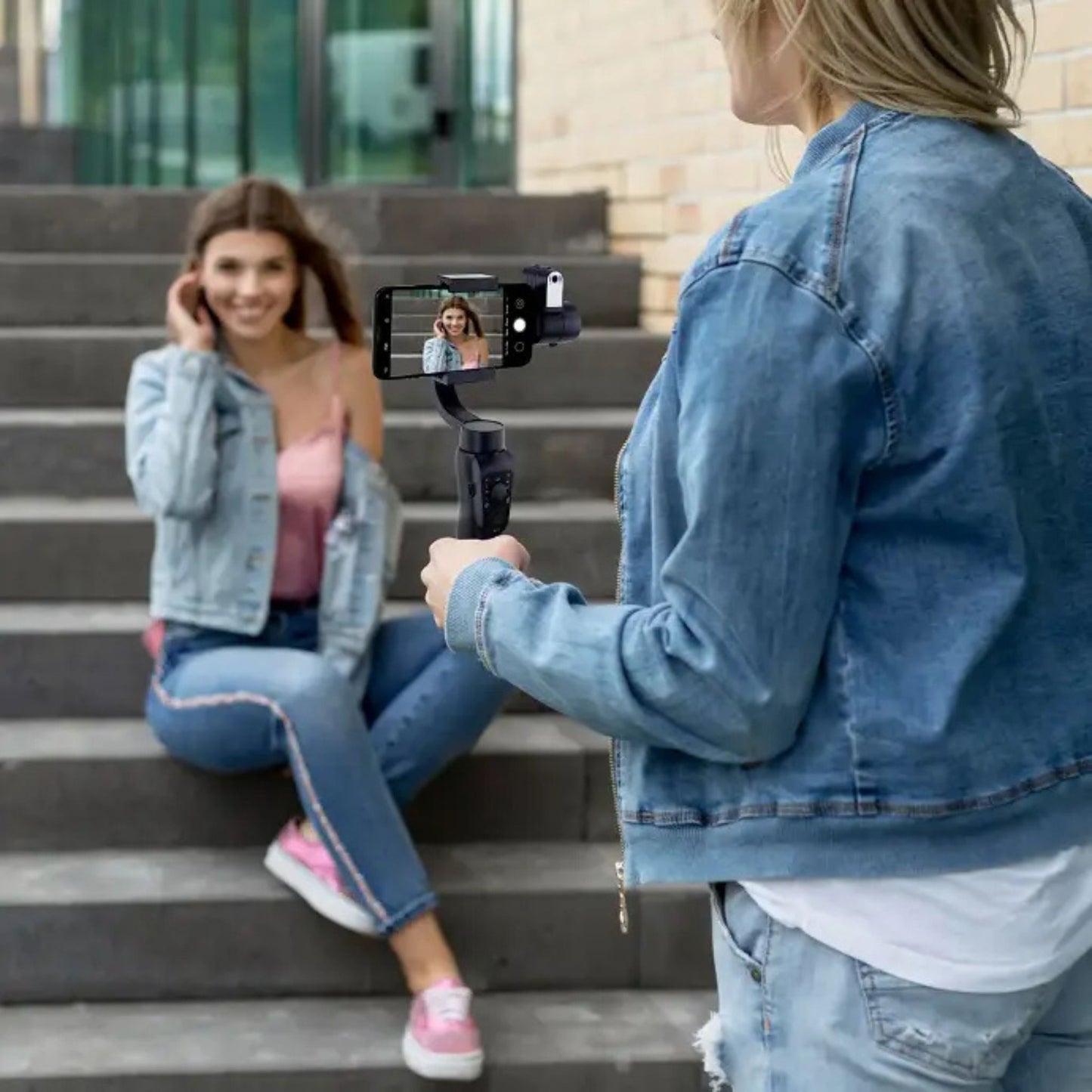The Porodo 3-Axis AI Tracker & Light Gimbal Stabilizer with Built-In Tripod, Object Tracking, Power Bank Function, 210 Minuets Charging Time - Black