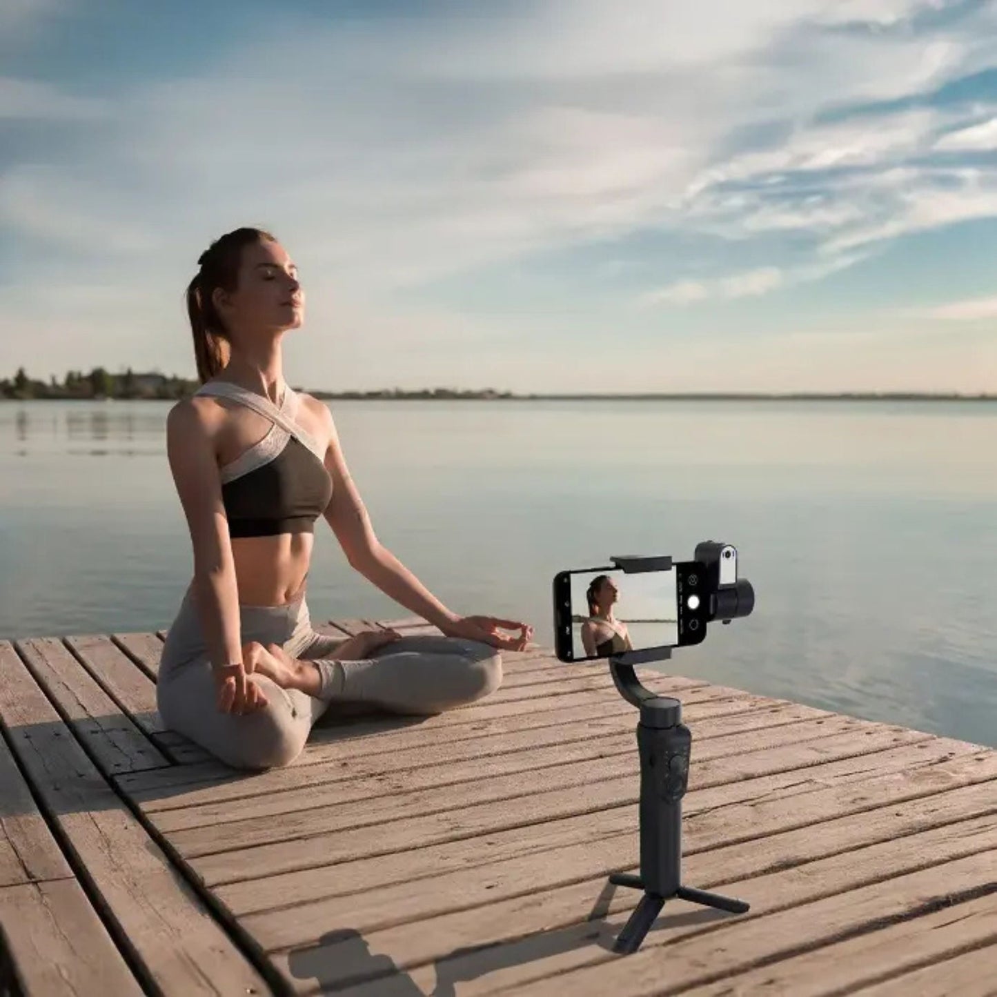 The Porodo 3-Axis AI Tracker & Light Gimbal Stabilizer with Built-In Tripod, Object Tracking, Power Bank Function, 210 Minuets Charging Time - Black