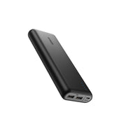 A black Anker PowerCore 20100 portable power bank with LED charging indicators and two USB ports.