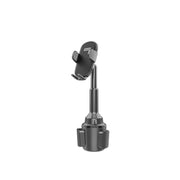 A black Green Lion brand car cup holder phone mount with a 360-degree rotation feature.
