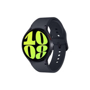 Samsung Galaxy Watch6 smartwatch with a black band and a graphite-colored case, displaying a vibrant green watch face.