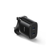 Black USB charger with multiple ports on a white background