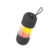 A cylindrical portable speaker with a black outer casing and multicolored RGB lights visible through a clear section.