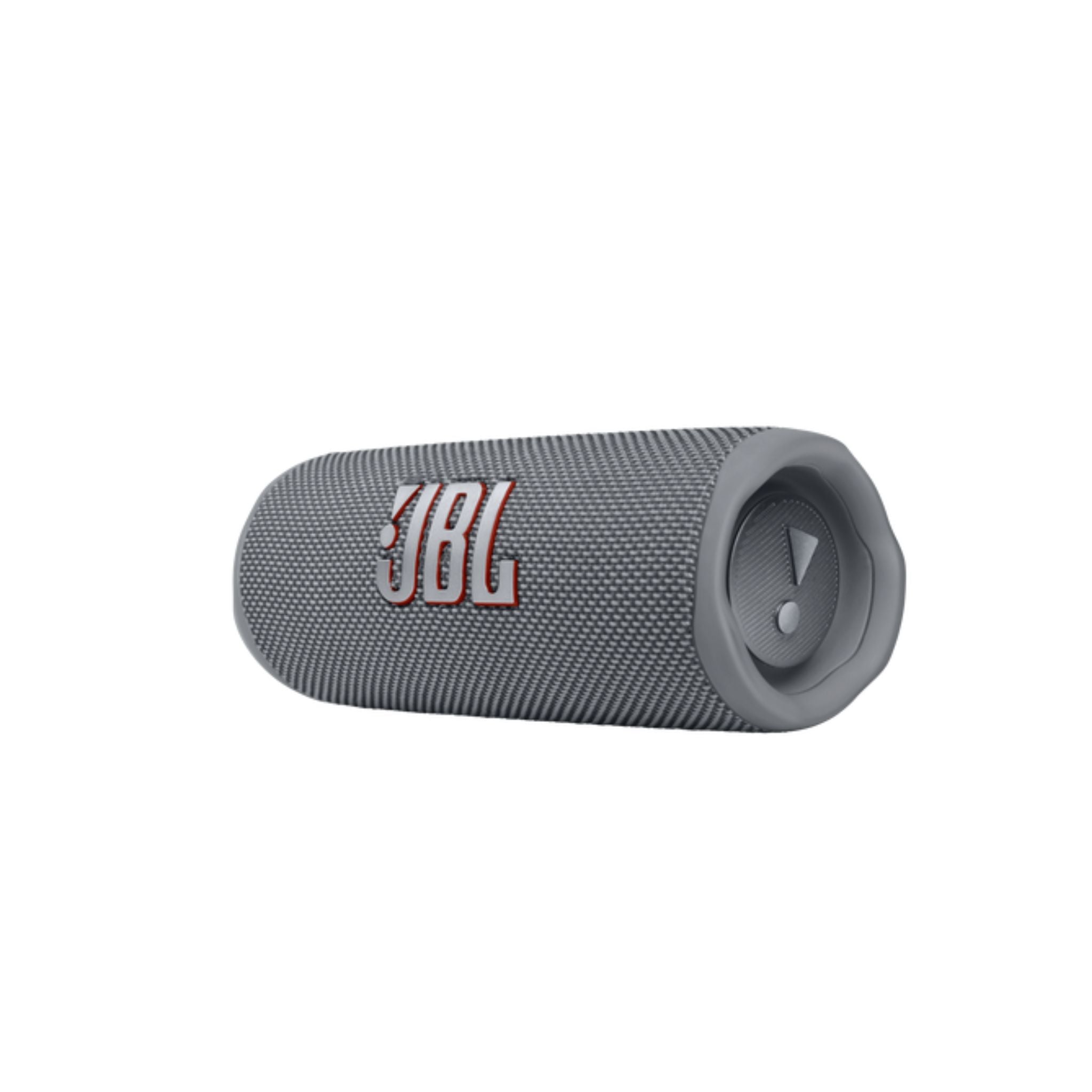A portable JBL Flip 6 speaker in gray color with the JBL logo visible on the front.