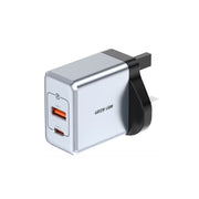 White USB wall adapter with two ports on a white background
