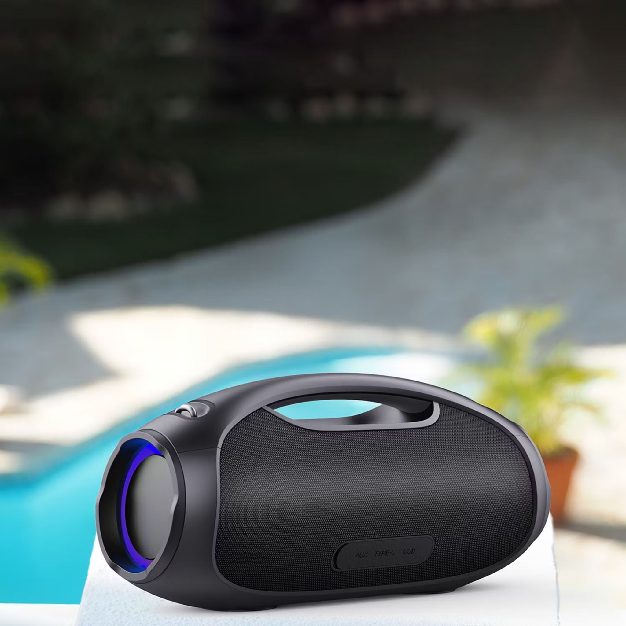 Porodo Soundtec Rush Euphoric Portable Speaker features Bluetooth 5.3, a 5400mAh battery, Type-C charging, IPX6 water resistance, 8-hour playtime, 15m range, power bank function, RGB lights, plus shoulder strap and grip handle- Black