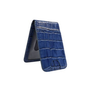 A blue leather magwallet holder with a quilted design and a movable stand.