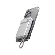 Silver phone case with charging cable on a white background