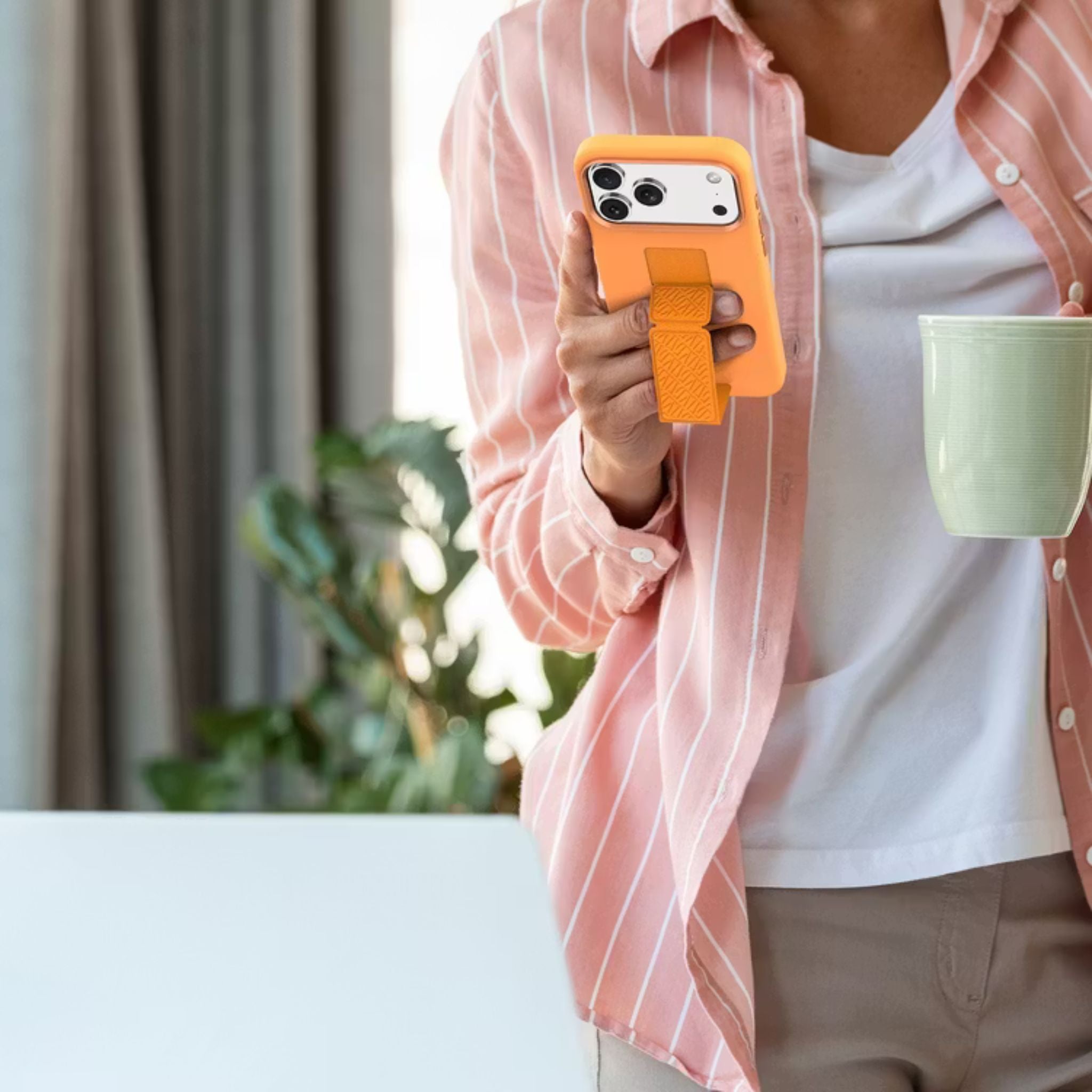 Levelo Morphix Silicone GripStand Case for iPhone 17 Pro, Hands-Free Viewing, True Microfiber Interior Lining, Horizontal & Vertical Stand, Shock-Resistant Bumper, Raised Bezels for Camera & Screen, Slim Fit Design - Orange