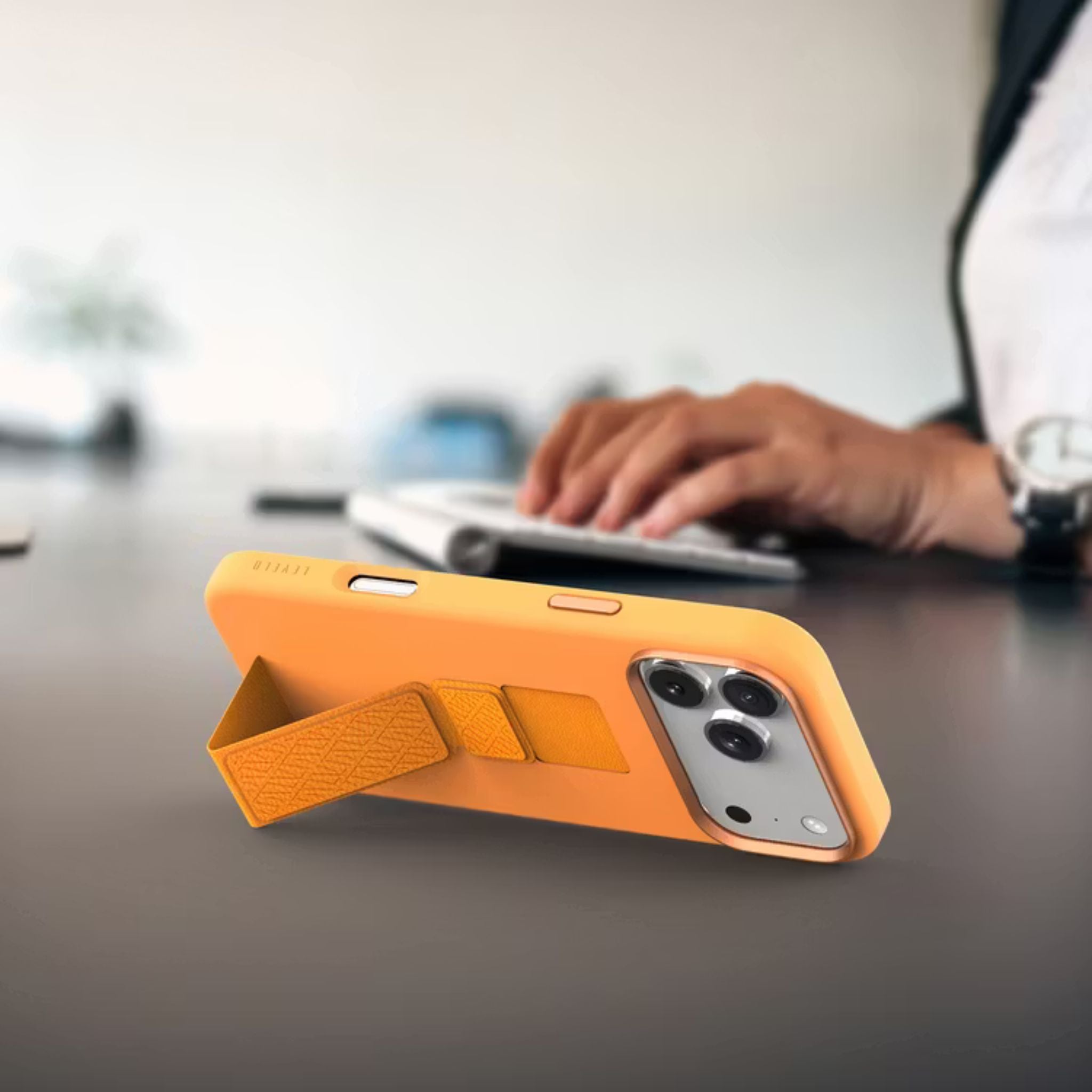 Levelo Morphix Silicone GripStand Case for iPhone 17 Pro Max, Hands-Free Viewing, True Microfiber Interior Lining, Horizontal & Vertical Stand, Shock-Resistant Bumper, Raised Bezels for Camera & Screen, Slim Fit Design - Orange