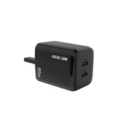 A dark green Green Lion dual PD wall charger with a UK plug and two USB-C ports, alongside a 1-meter USB-C to USB-C cable.