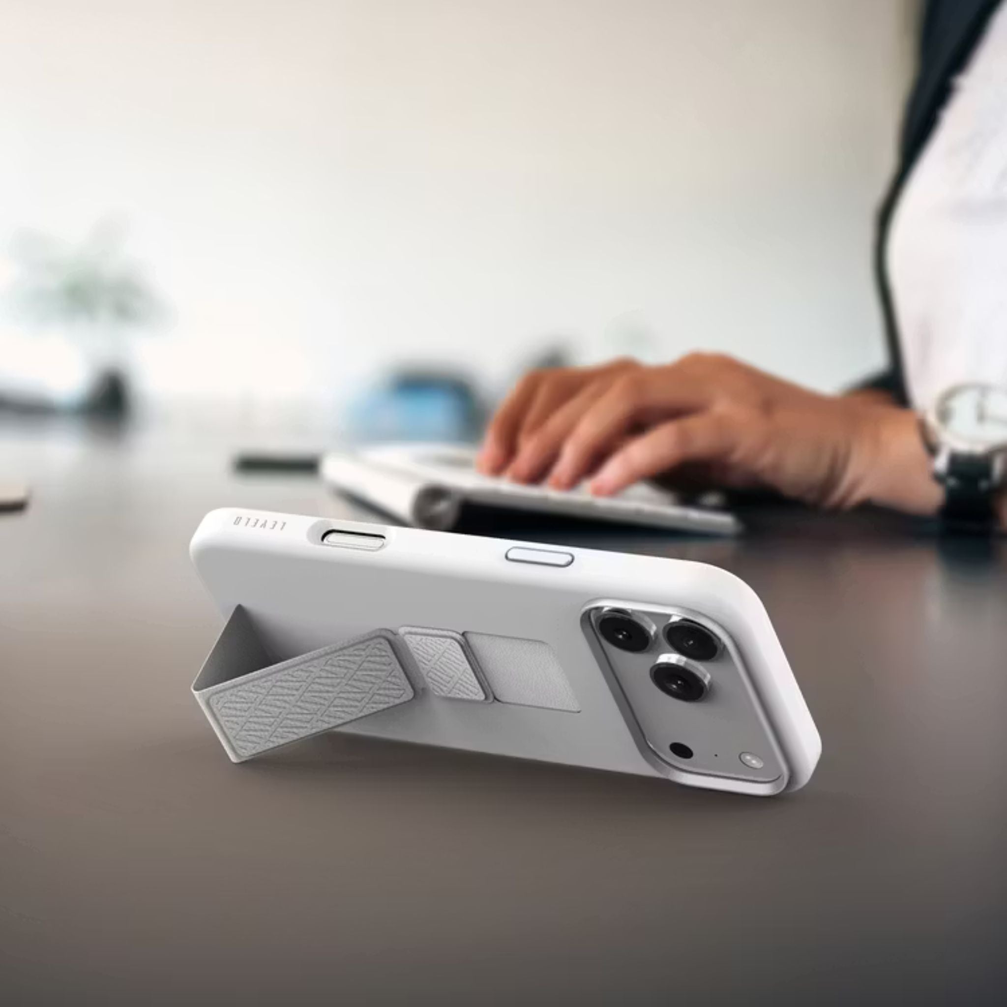 Levelo Morphix Silicone GripStand Case for iPhone 17 Pro, Hands-Free Viewing, True Microfiber Interior Lining, Horizontal & Vertical Stand, Shock-Resistant Bumper, Raised Bezels for Camera & Screen, Slim Fit Design - Silver