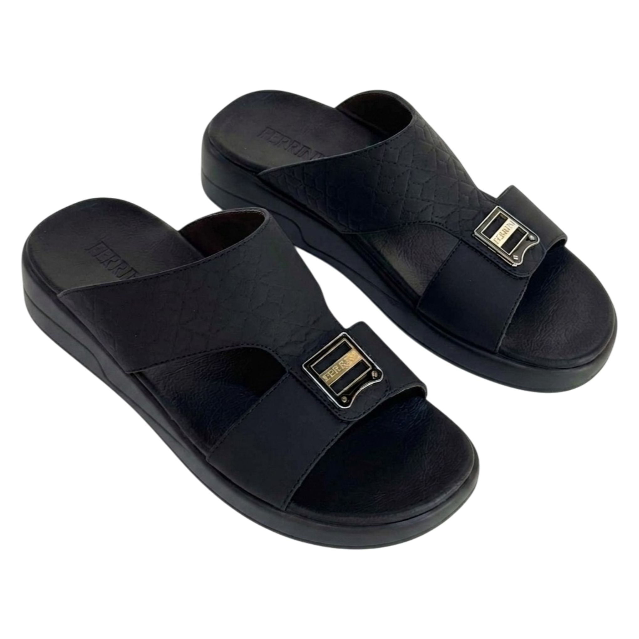 Black sandals with gold buckles on a white background
