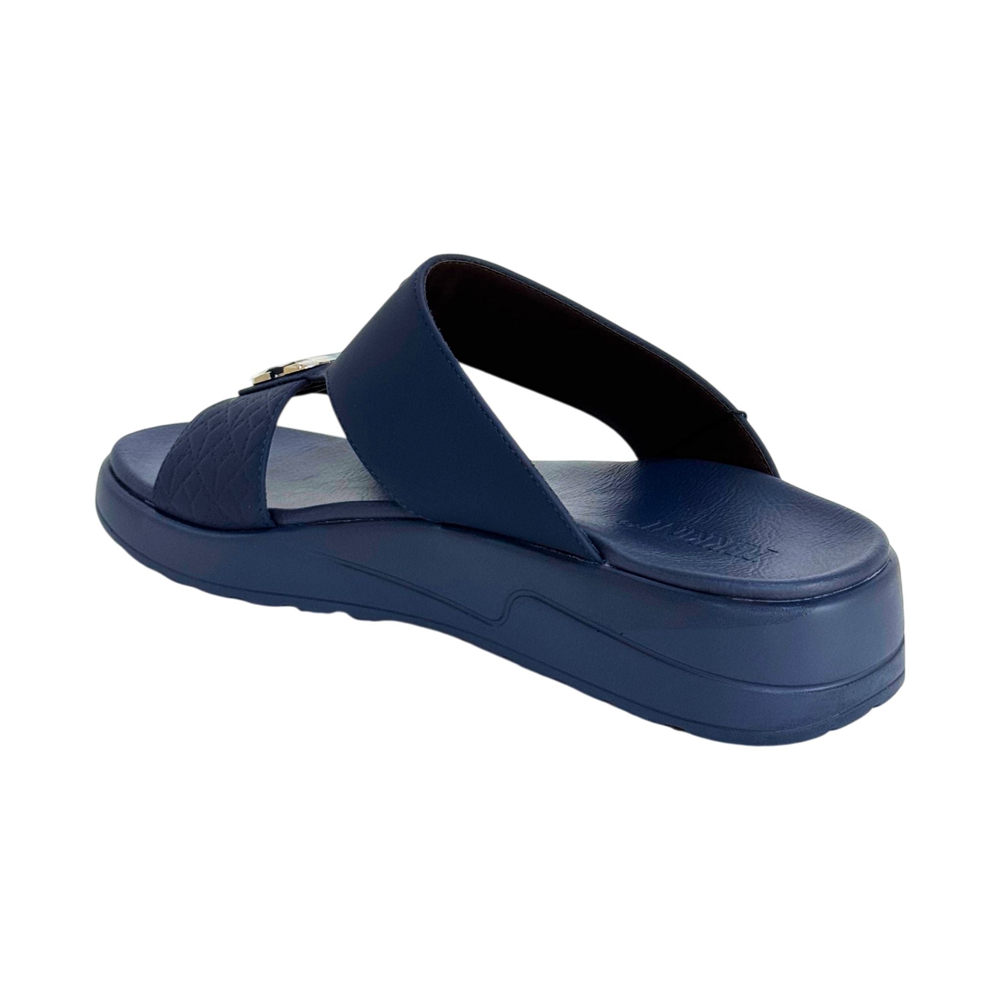 Navy blue sandal on a white background