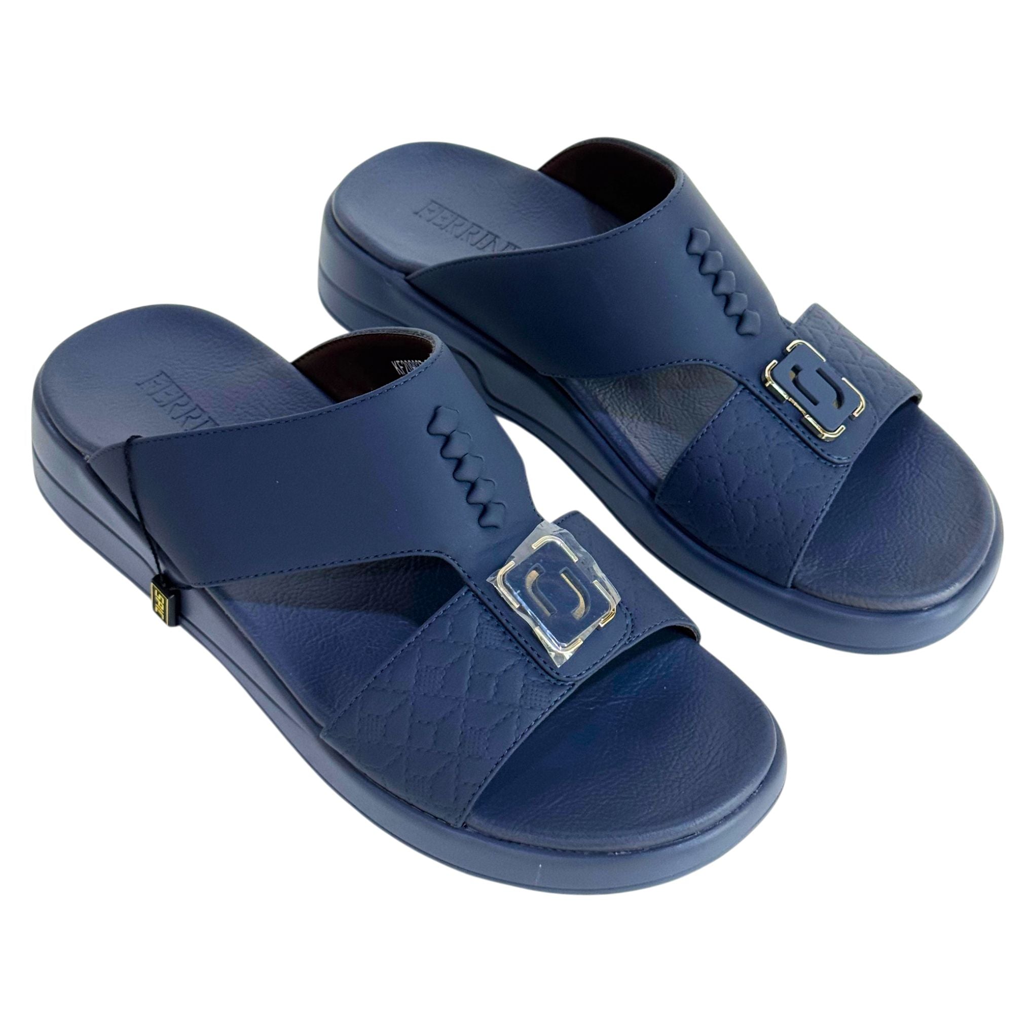 Pair of blue sandals with buckles on a white background