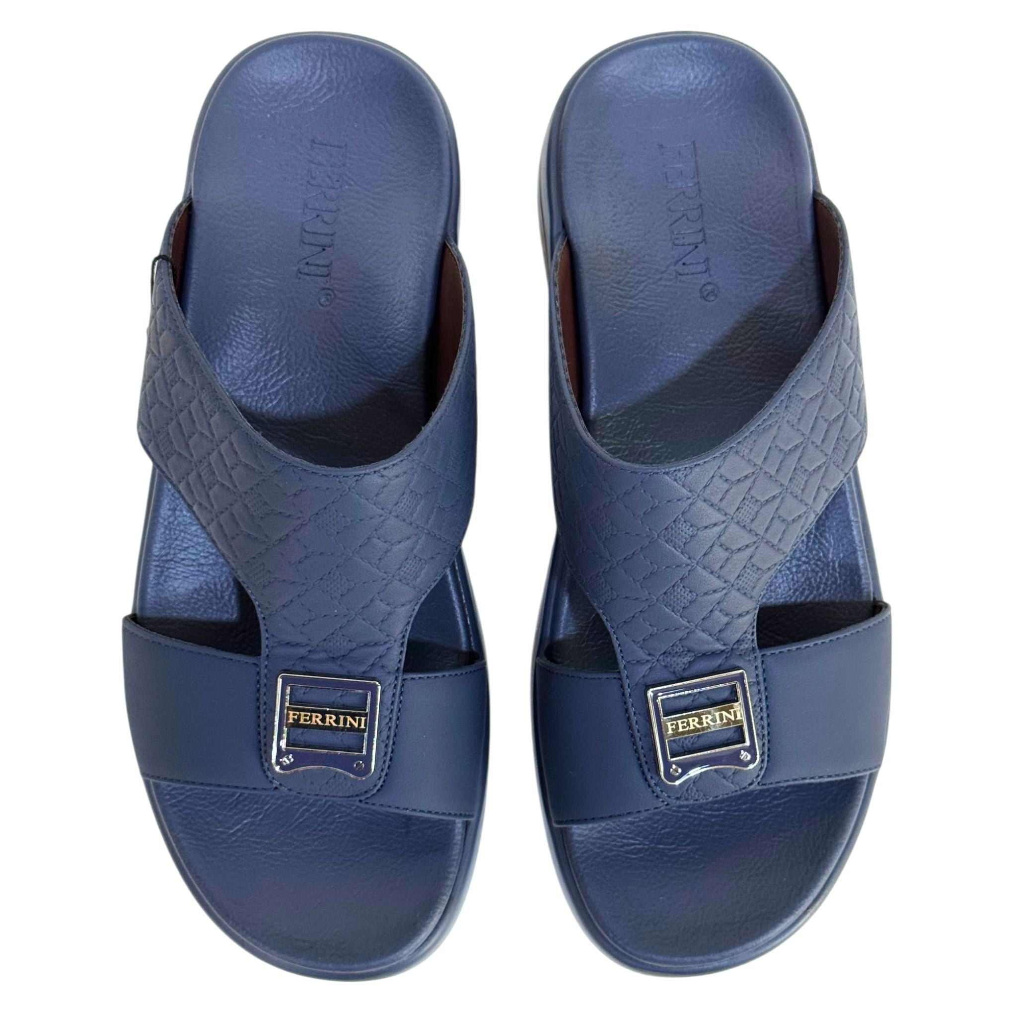 Pair of blue sandals with a brand logo on a white background
